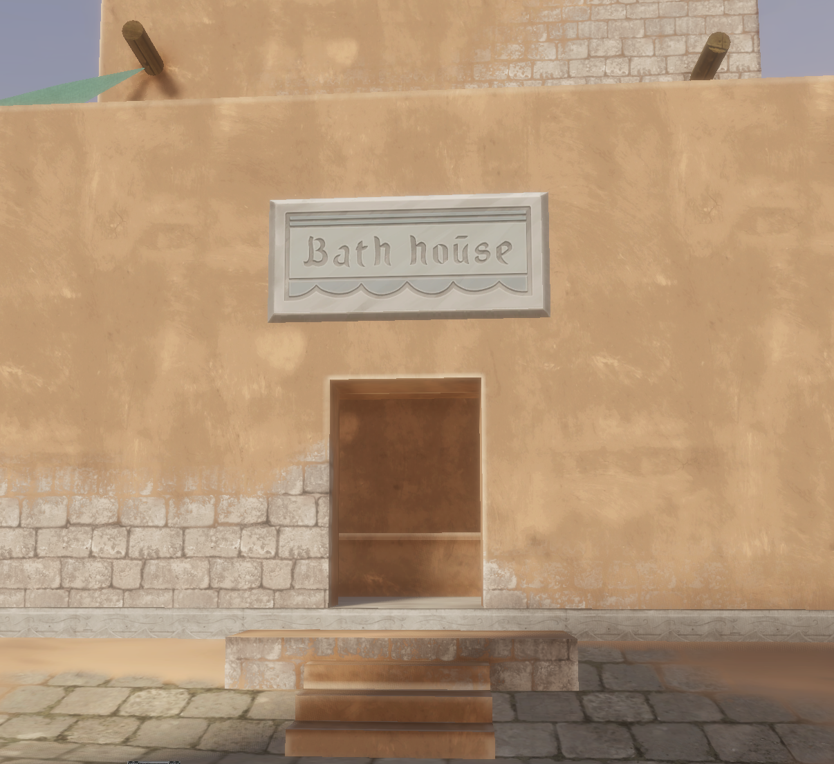 Signed exterior entrance to the Night Harbor Bath House